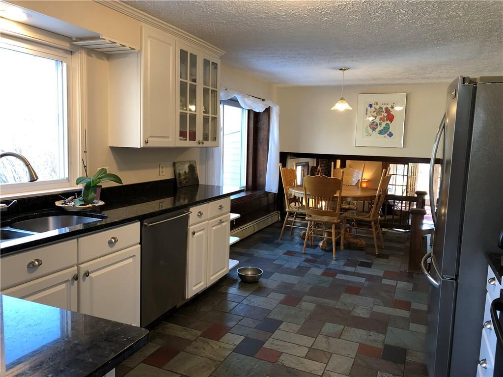 52 Brighton Hill Road Hebron, ME 04238 - Photo 15 of 35 Open and bright kitchen with slate...