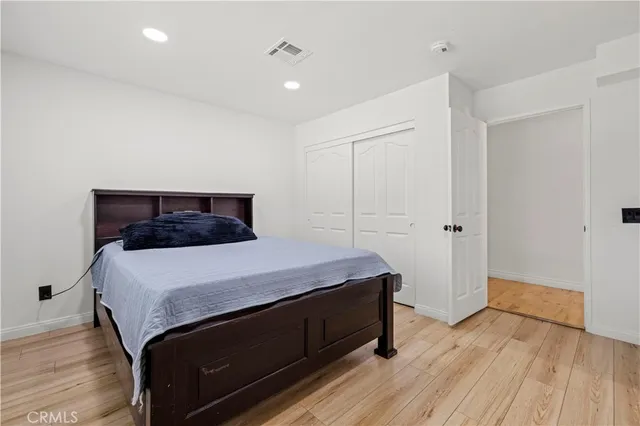 a bathroom with a shower and a glass door