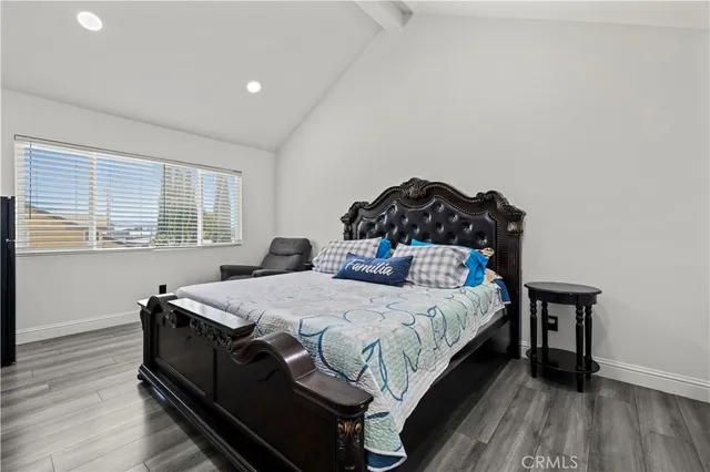 a spacious bathroom with a granite countertop tub sink and mirror
