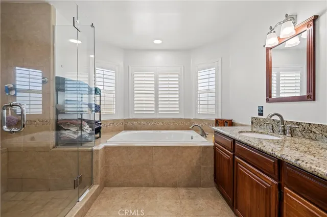a view of a house with outdoor space and sitting area