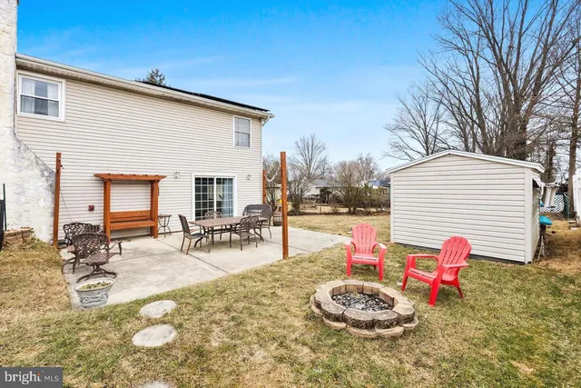 a backyard of a house with seating space