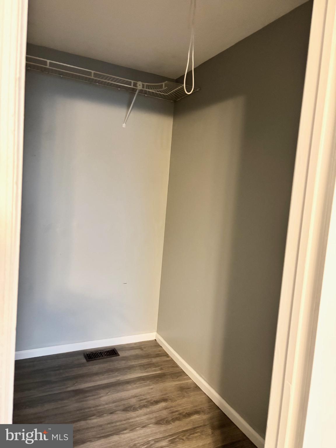 61 Berkshire Road Sicklerville, NJ 08081 - Photo 11 of 14 a view of a room with wooden floor and small window