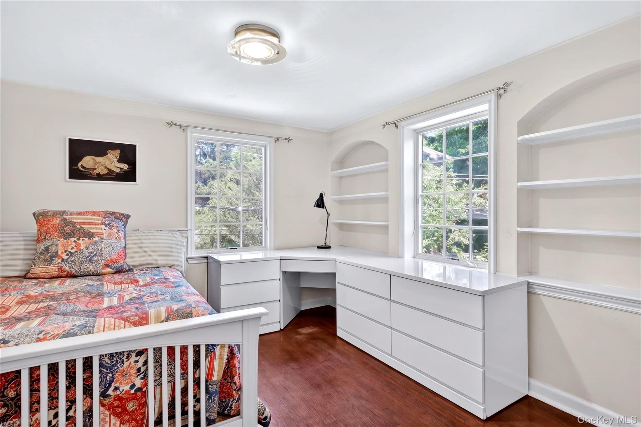 60 Mill Spring Road Manhasset, NY 11030 - Photo 16 of 18 a living room with furniture and a window