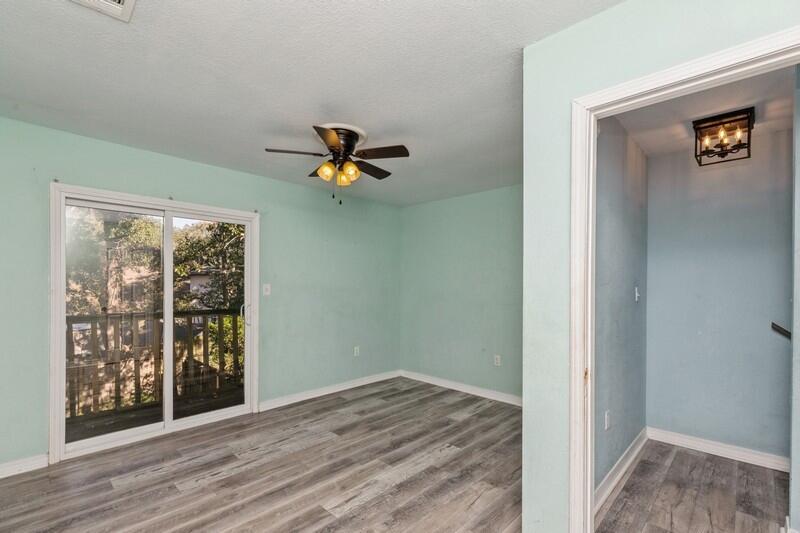14 Gardner Drive Shalimar, FL 32579 - Photo 14 of 27 a view of empty room with wooden floor and fan