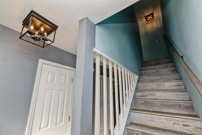 14 Gardner Drive Shalimar, FL 32579 - Photo 2 of 27 a view of a hallway with wooden floor and entryway