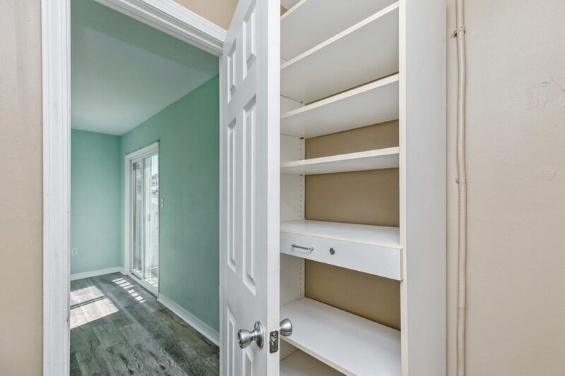 14 Gardner Drive Shalimar, FL 32579 - Photo 23 of 27 a view of an empty walk in closet