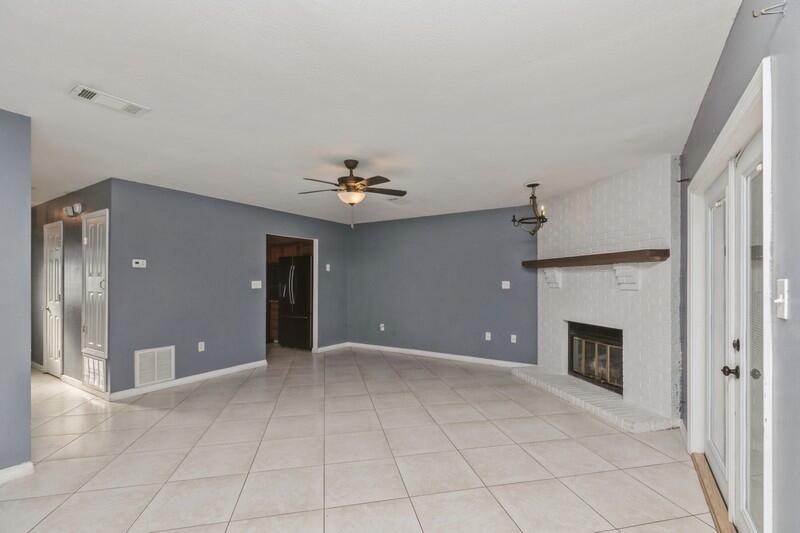 14 Gardner Drive Shalimar, FL 32579 - Photo 7 of 27 a view of an empty room with a fireplace