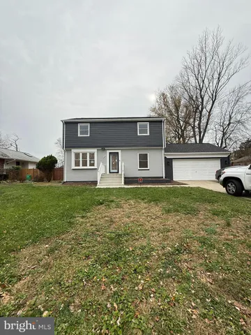 a house view with a garden space