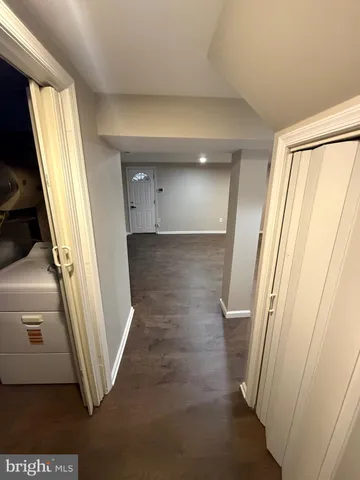 a view of a hallway view with staircase