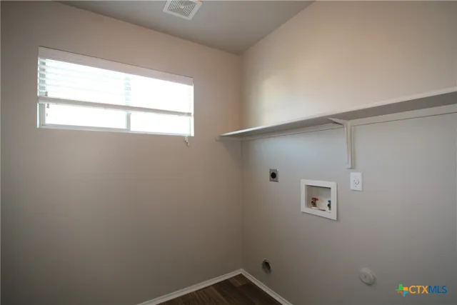 a view of a small space with a window