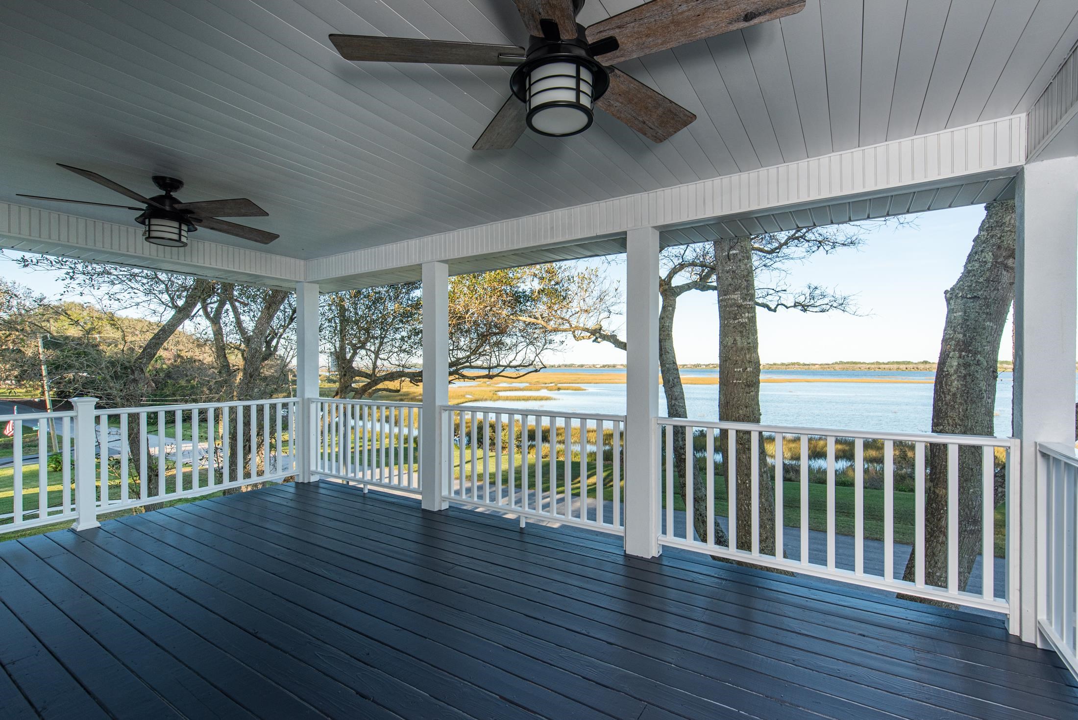 141 Jupiter Road St. Augustine, FL 32086 - Photo 3 of 48 a view of a porch with wooden floor