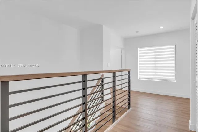 a view of entryway with wooden floor