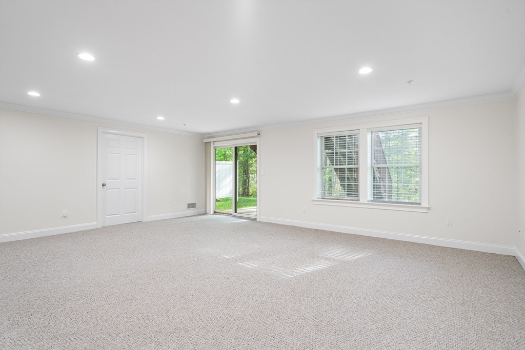 215 Rangeway Road, Unit 31 Billerica, MA 01862 - Photo 30 of 40 an empty room with windows