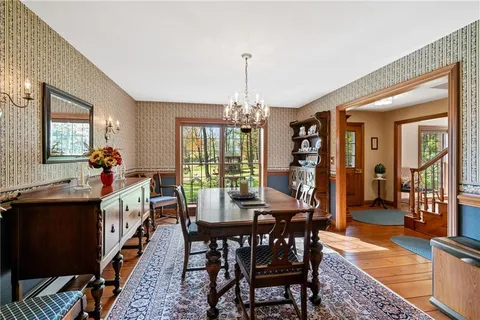 a kitchen with refrigerator and cabinets