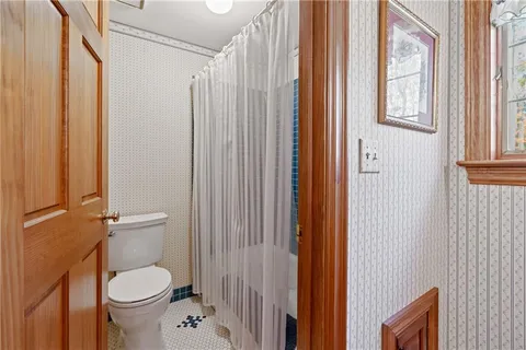 a view of a town with palm trees