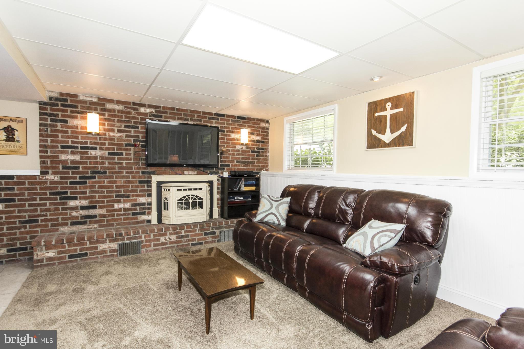 117 Boxthorn Road Abingdon, MD 21009 - Photo 19 of 30 Family Room w/Pellet Stove & Brick Hearth