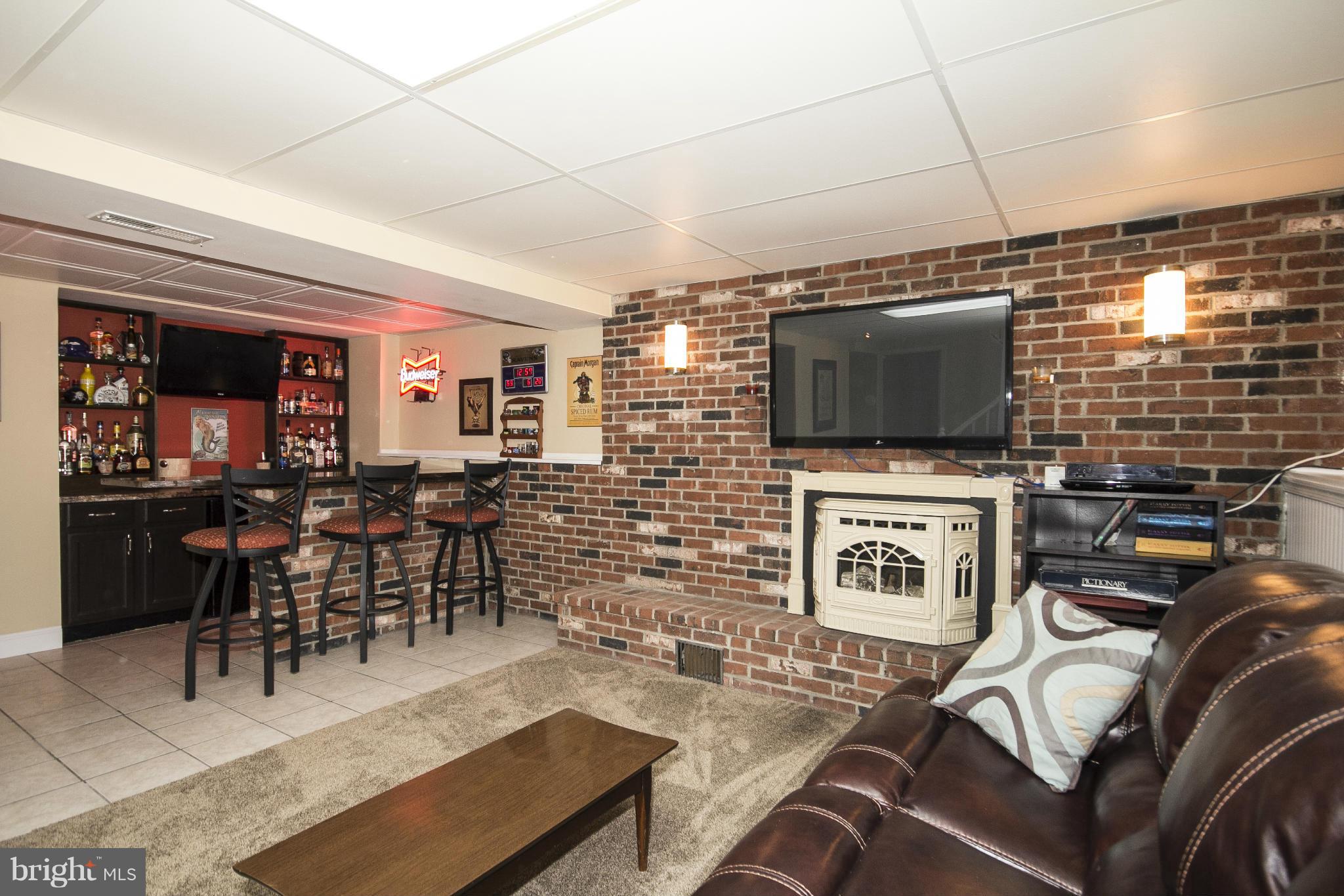117 Boxthorn Road Abingdon, MD 21009 - Photo 20 of 30 Family Room w/Bar & Ceramic Tile In-Lay