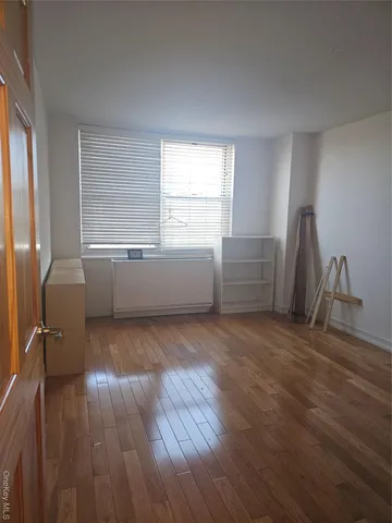 a room with furniture and a window