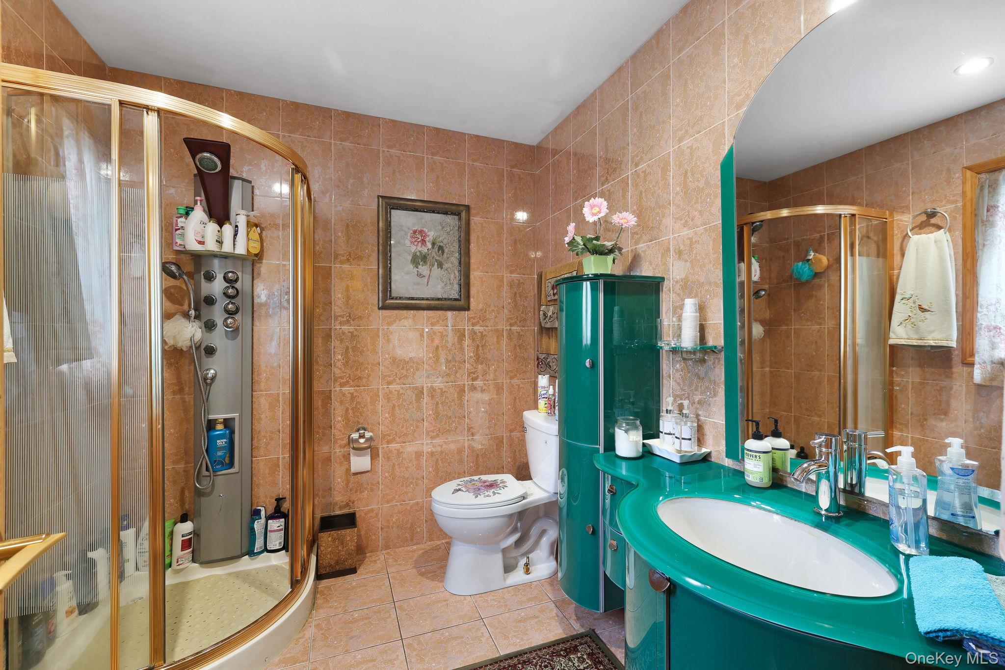 969 Hurd Road Jeffersonville, NY 12748 - Photo 16 of 33 a bathroom with a toilet sink and shower