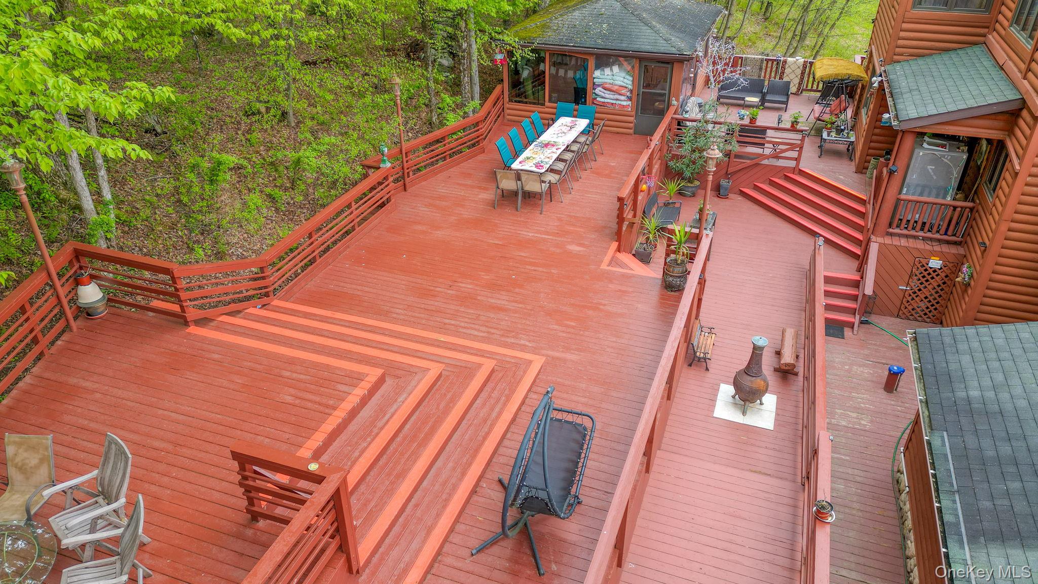 969 Hurd Road Jeffersonville, NY 12748 - Photo 2 of 33 a view of a patio with chairs and potted plants