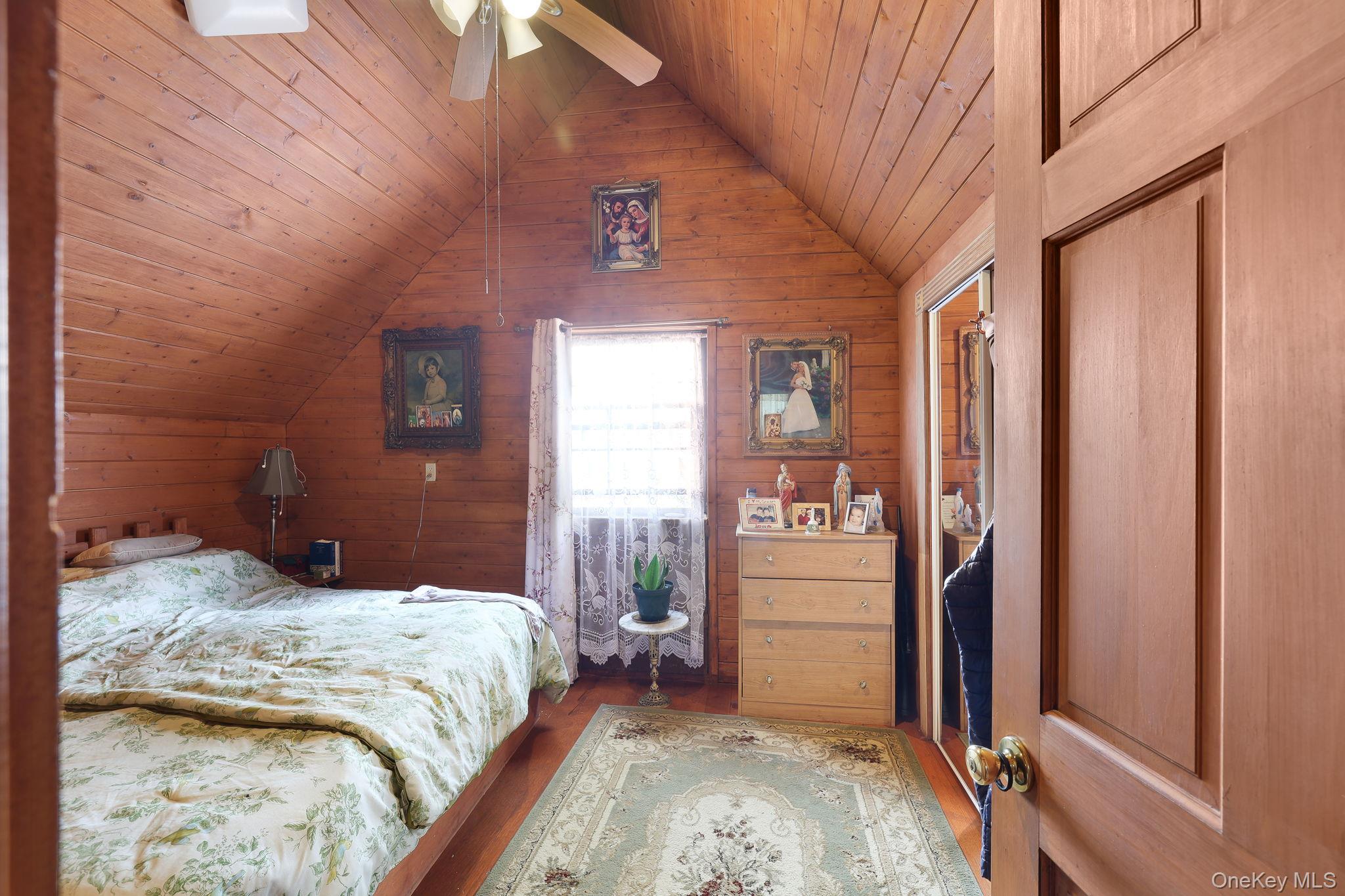 969 Hurd Road Jeffersonville, NY 12748 - Photo 26 of 33 a bedroom with a bed and a window