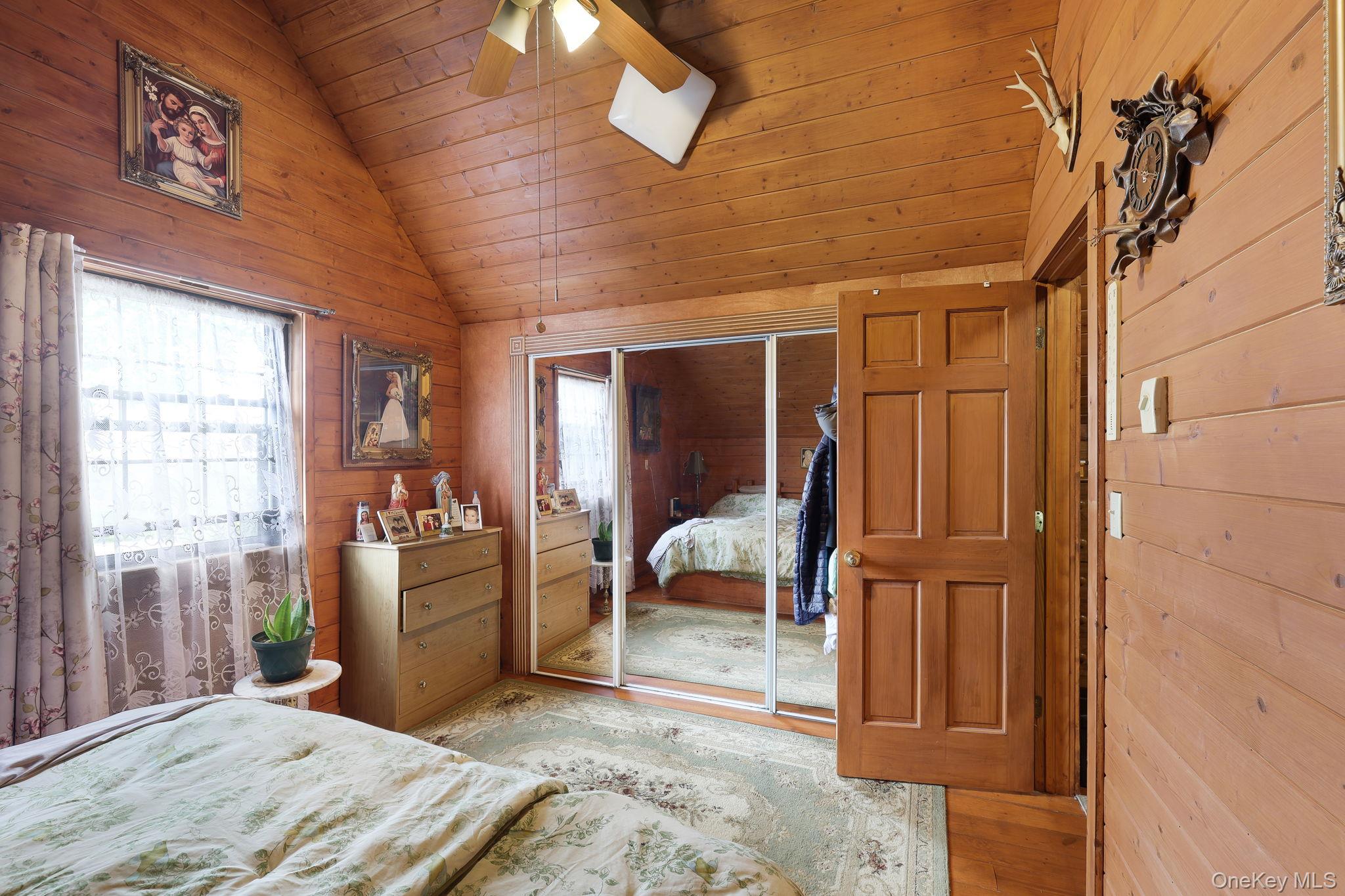 969 Hurd Road Jeffersonville, NY 12748 - Photo 27 of 33 a bedroom with furniture and a window