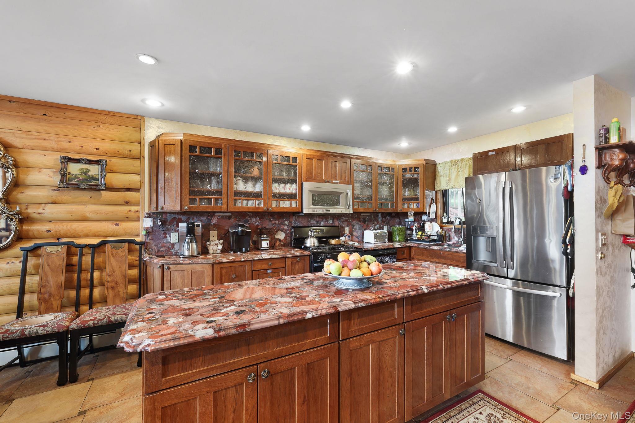 969 Hurd Road Jeffersonville, NY 12748 - Photo 4 of 33 a kitchen with large counter top space and stainless steel appliances