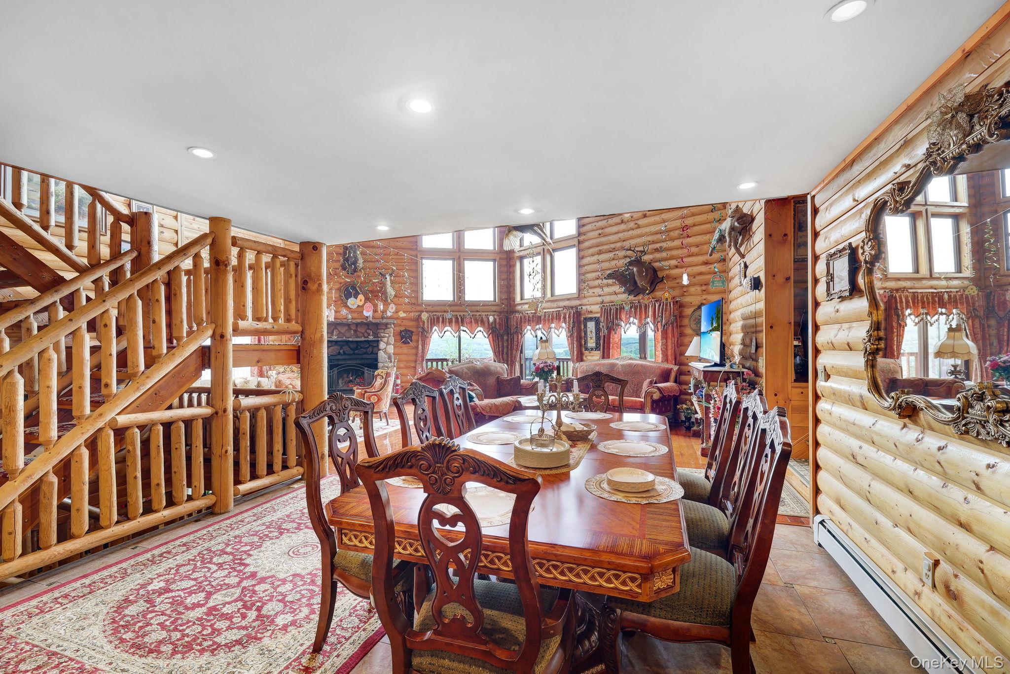969 Hurd Road Jeffersonville, NY 12748 - Photo 5 of 33 a view of a dining room with furniture window and wooden floor