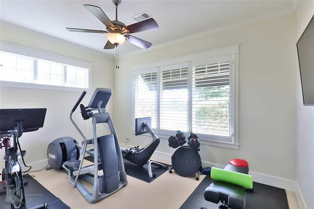a living room with furniture chess table and a window