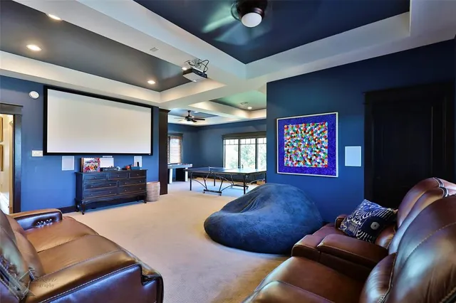 a room with furniture and a flat screen tv