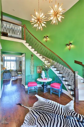 a view of a balcony patio and dining room