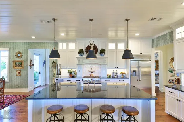 a view of kitchen and dining area with furniture