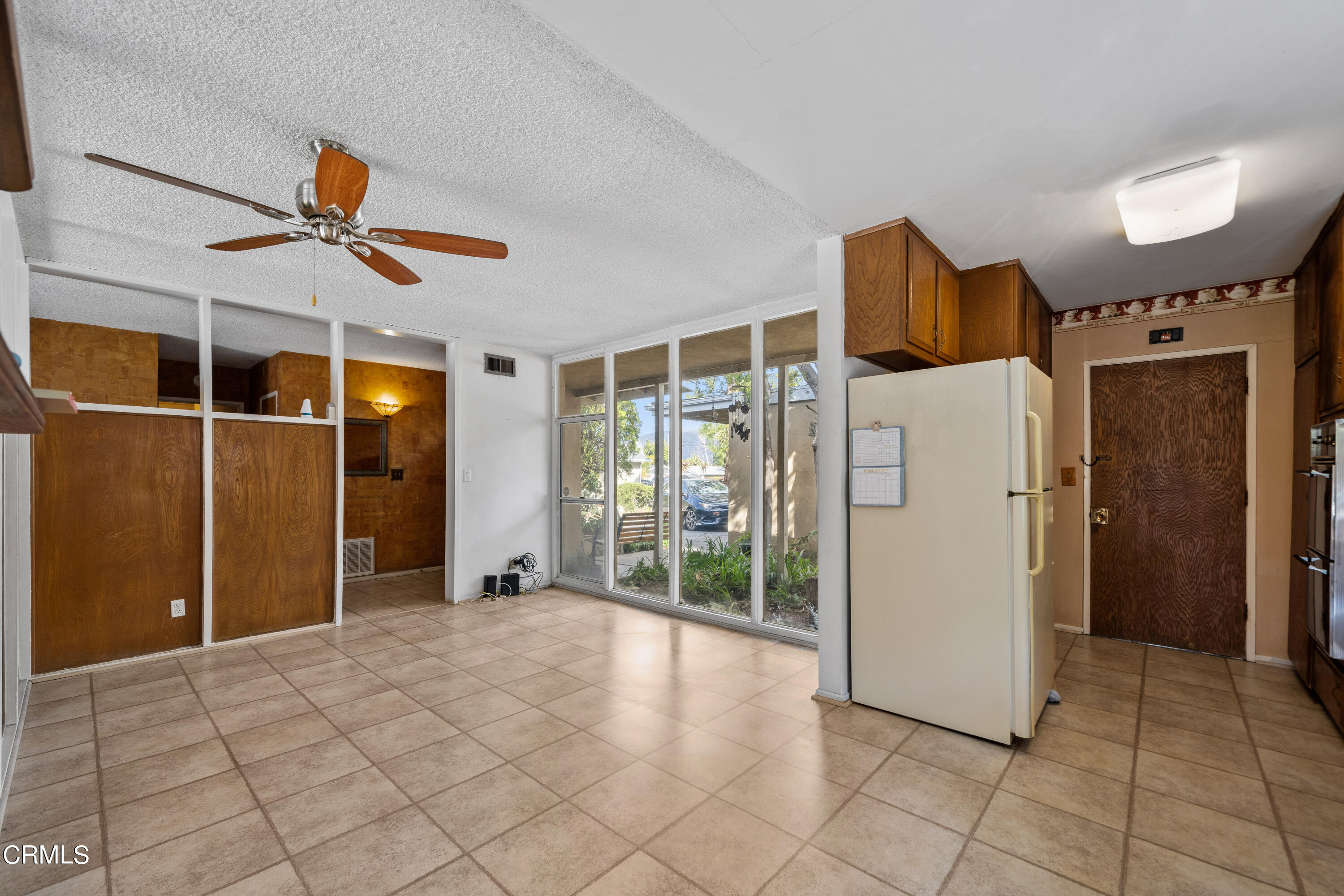 7024 Charrick Place Tujunga, CA 91042 - Photo 12 of 45 a view of a livingroom with a furniture and a ceiling fan