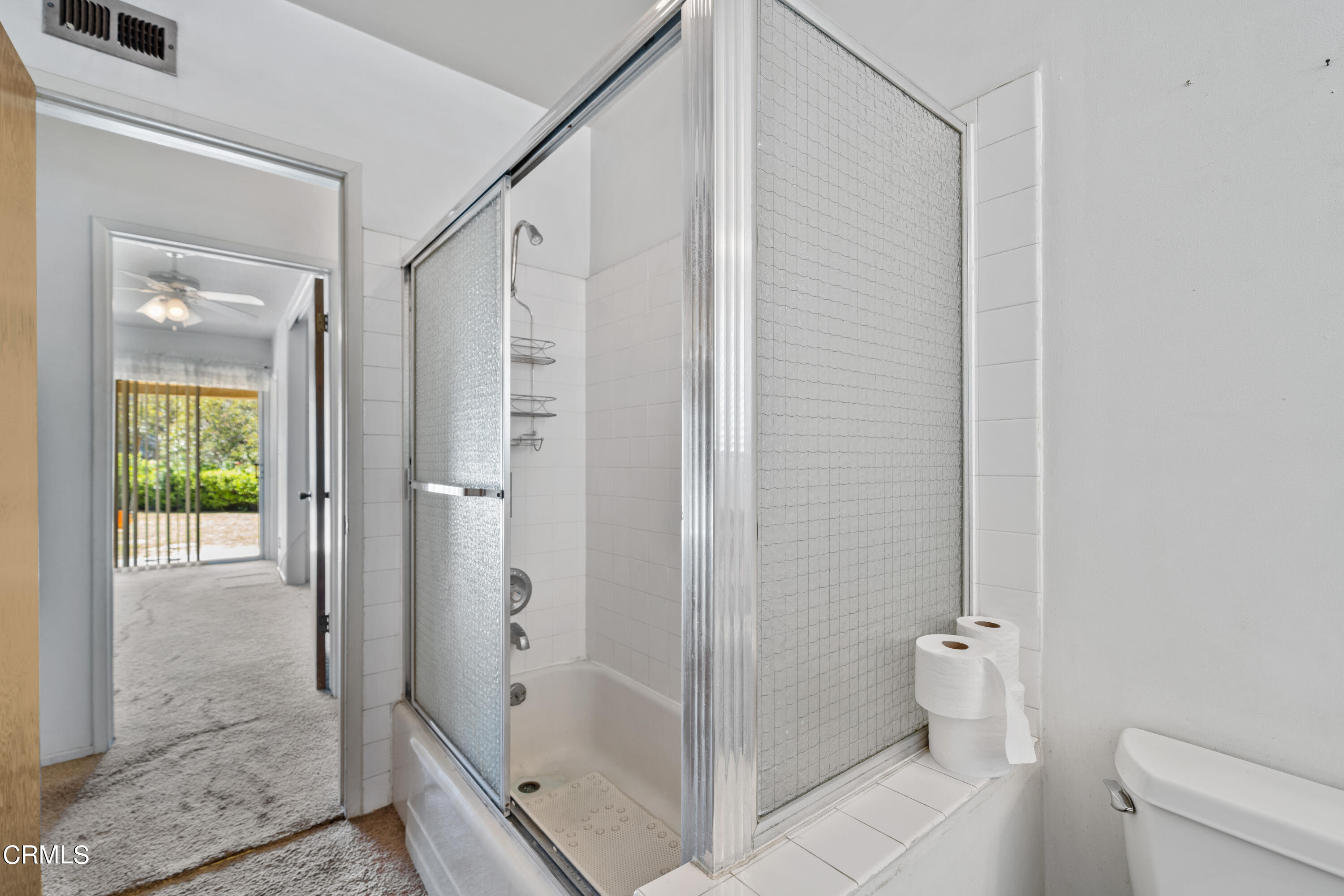 7024 Charrick Place Tujunga, CA 91042 - Photo 20 of 45 a bathroom with a shower and a toilet