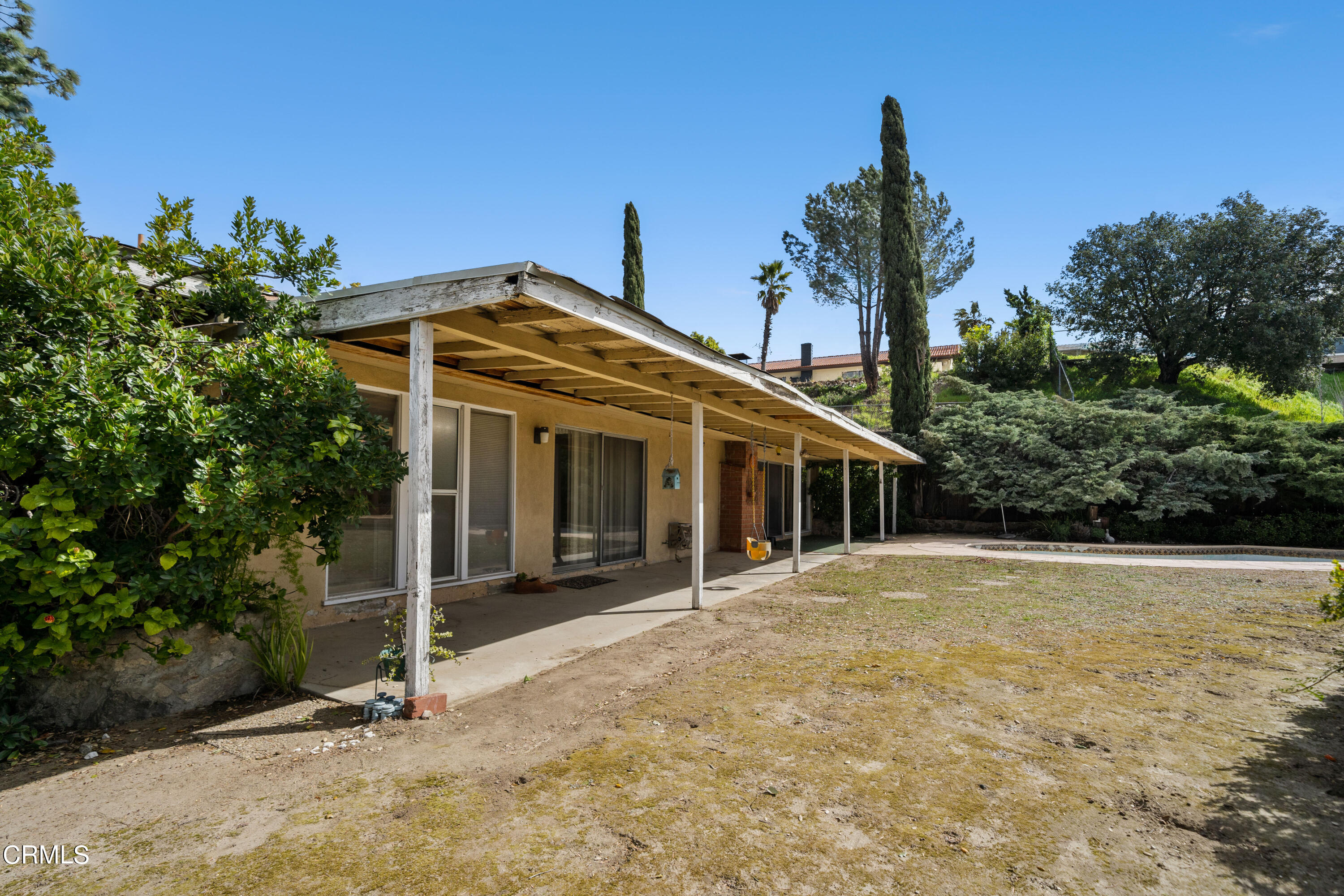7024 Charrick Place Tujunga, CA 91042 - Photo 35 of 45 a front view of a house with a yard