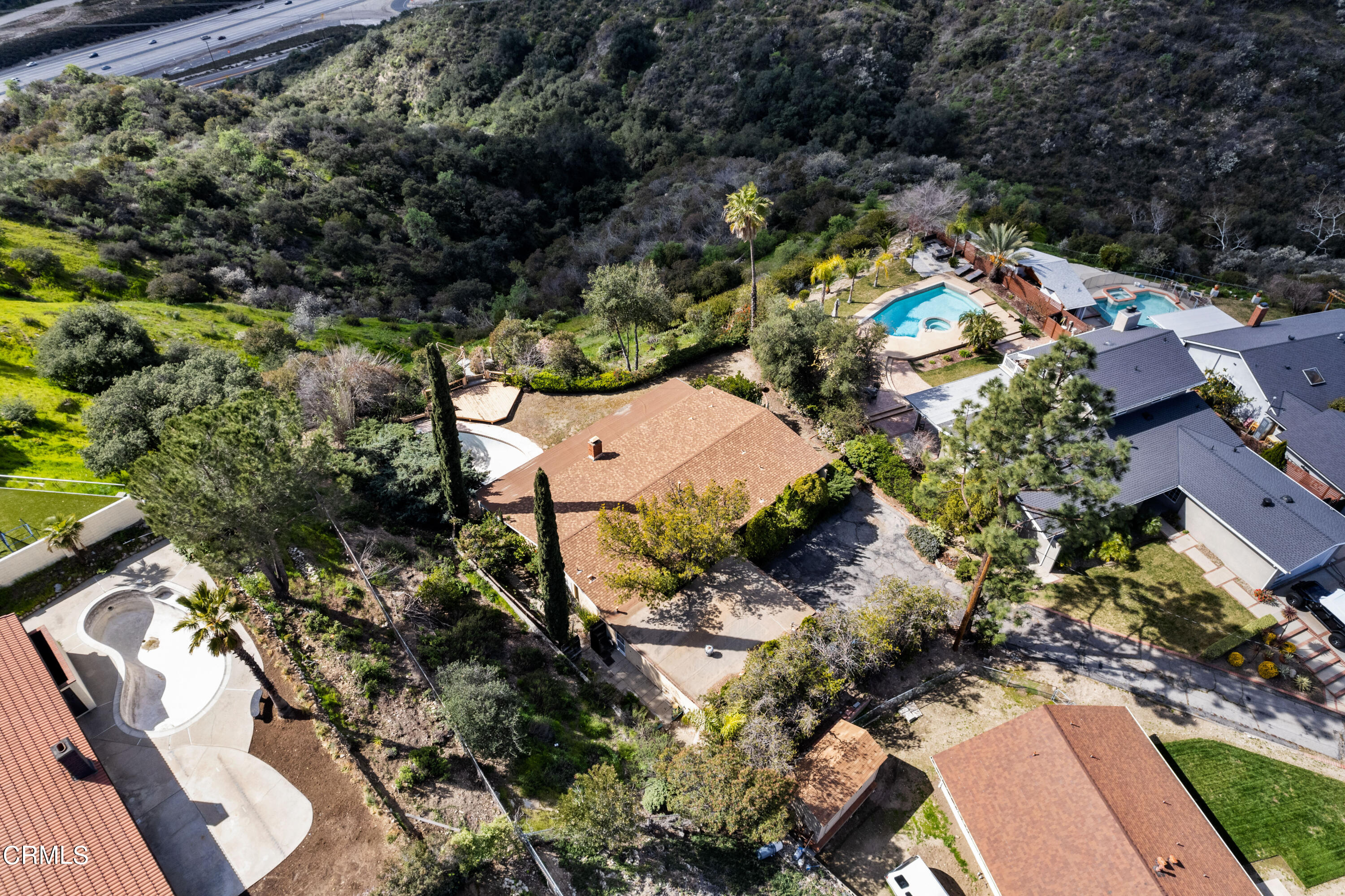 7024 Charrick Place Tujunga, CA 91042 - Photo 43 of 45 an aerial view of house with yard swimming pool and outdoor seating