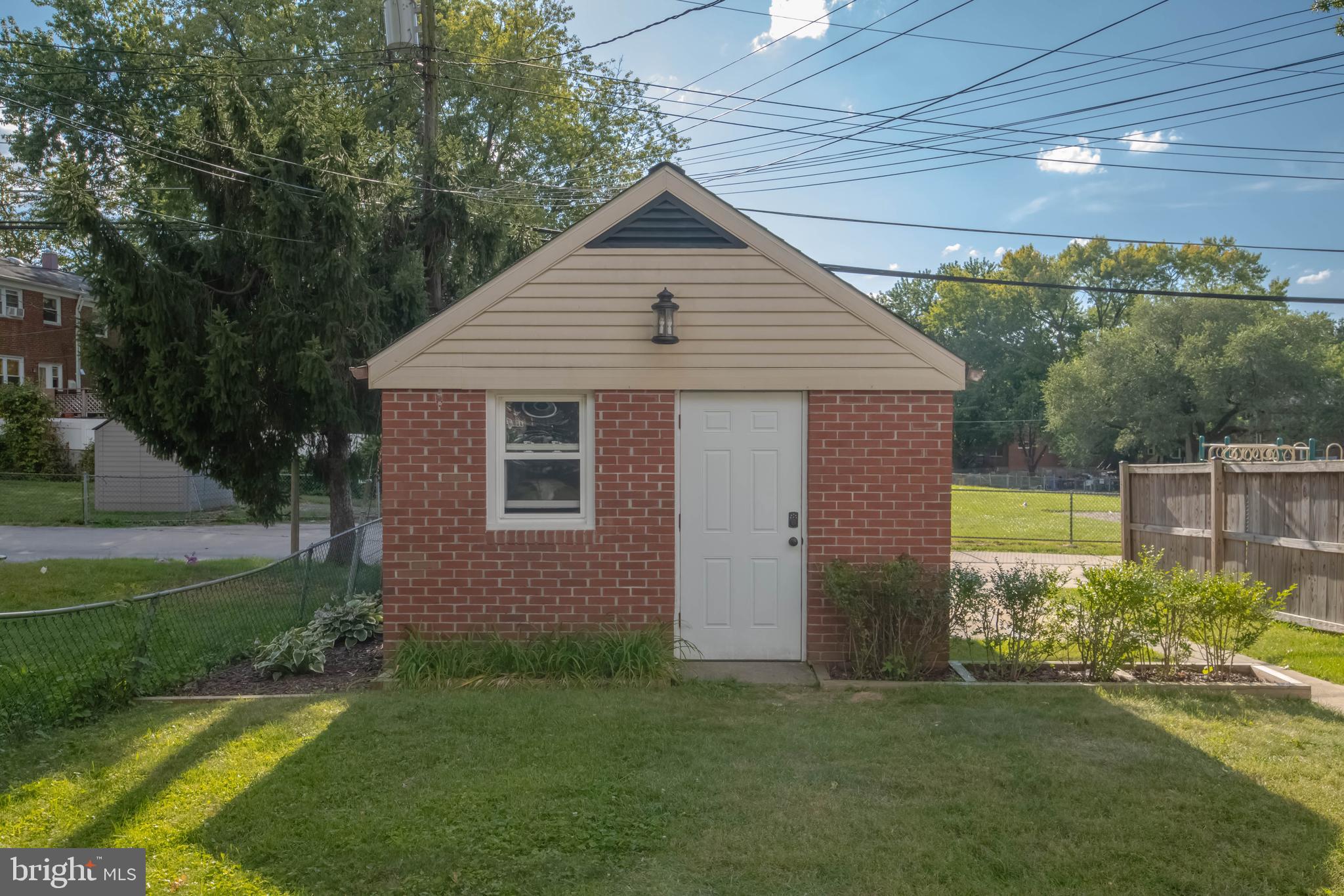 8528 Kings Ridge Road Baltimore, MD 21234 - Photo 43 of 45 a front view of a house with a yard
