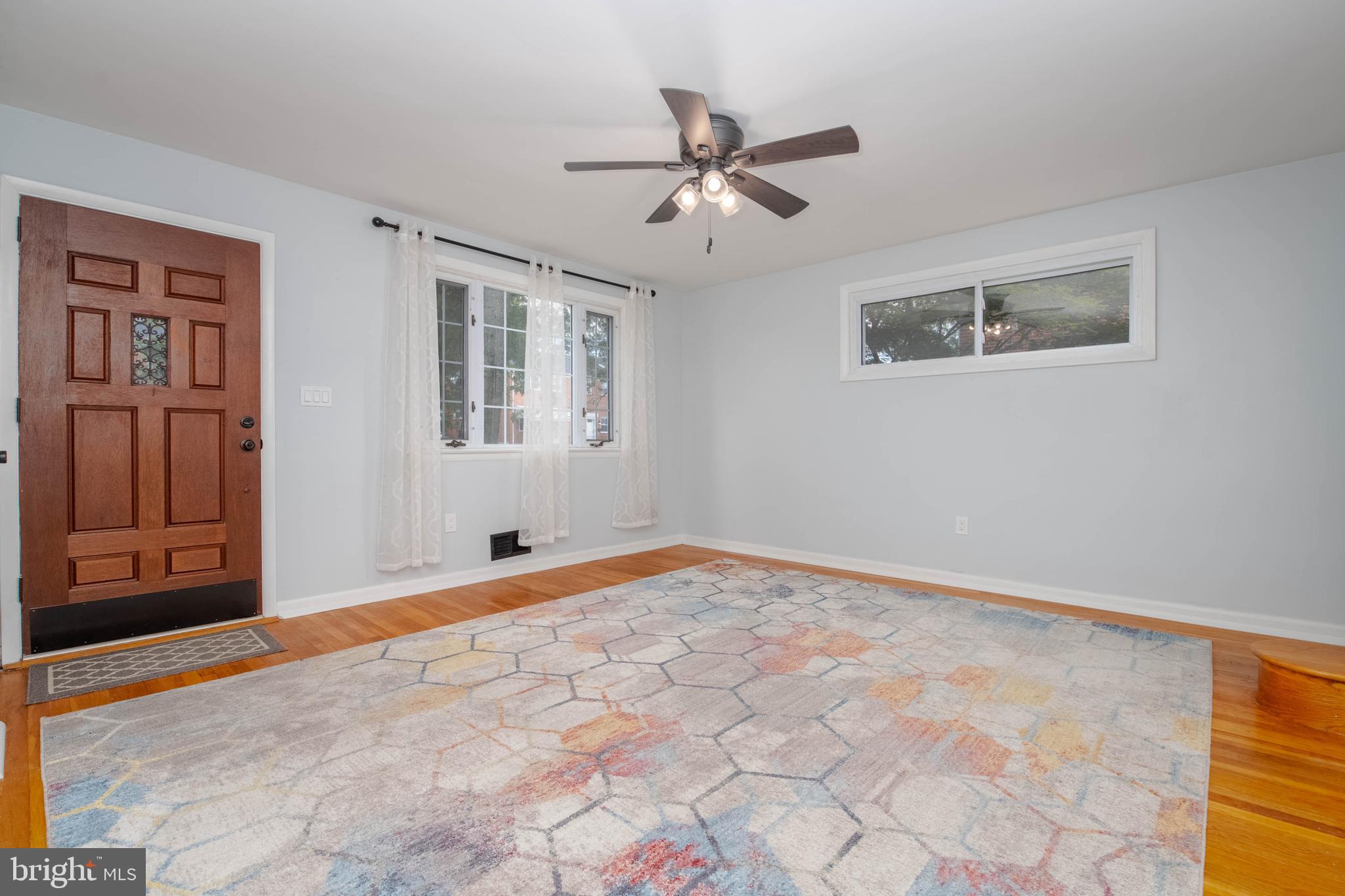 8528 Kings Ridge Road Baltimore, MD 21234 - Photo 6 of 45 a view of an empty room with a window