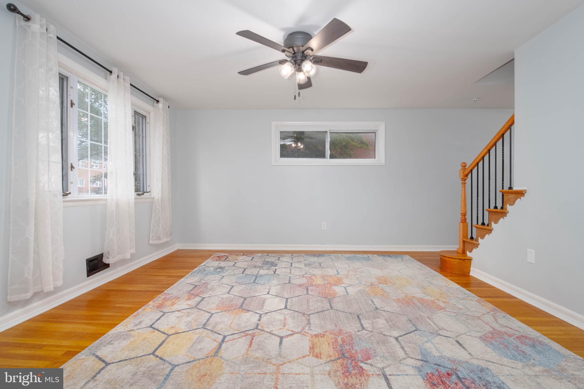 8528 Kings Ridge Road Baltimore, MD 21234 - Photo 7 of 45 a view of an empty room with a window