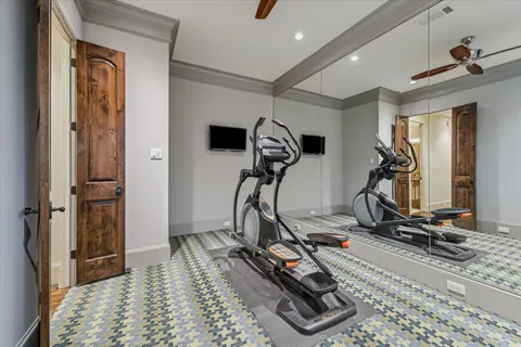 a view of a room with gym equipment