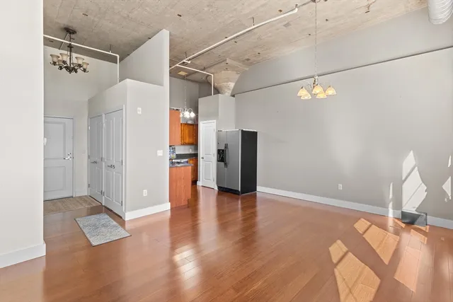 a view of a livingroom with wooden floor