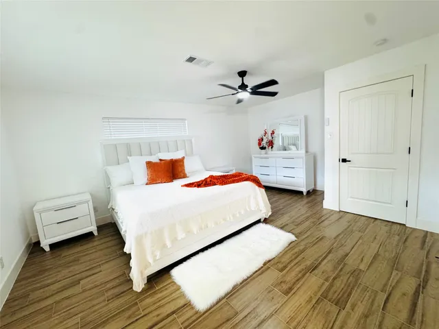 a bathroom with a sink double vanity and a mirror