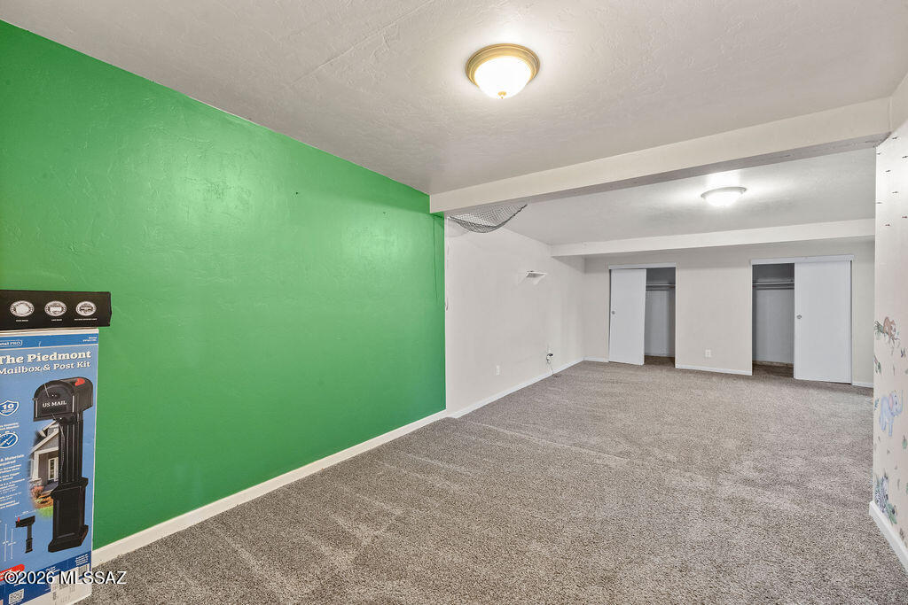 1301 West Kleindale Road Tucson, AZ 85705 - Photo 21 of 27 an empty room with closet