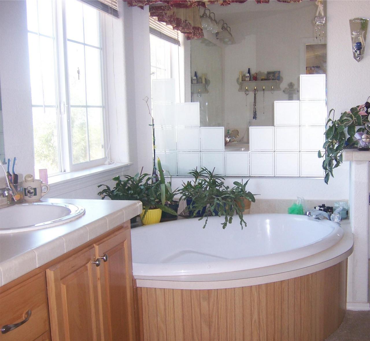 7650 Fisher Road Shingletown, CA 96088 - Photo 6 of 8 a bathroom with a sink and a bathtub