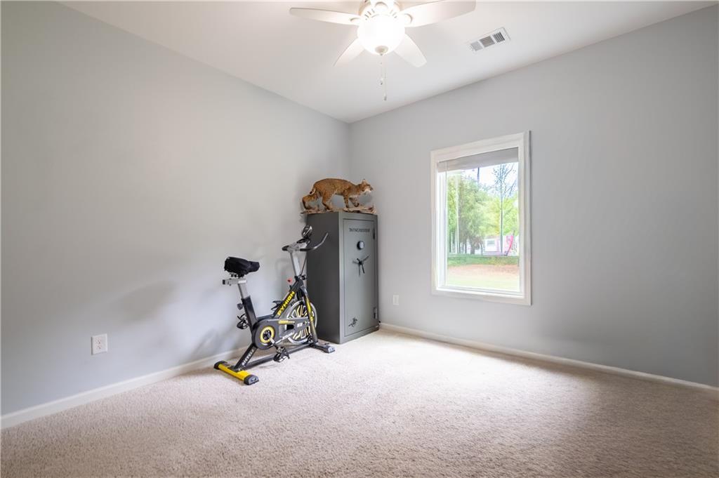 719 Fairview Road Brooks, GA 30205 - Photo 19 of 35 a view of a room with gym equipment