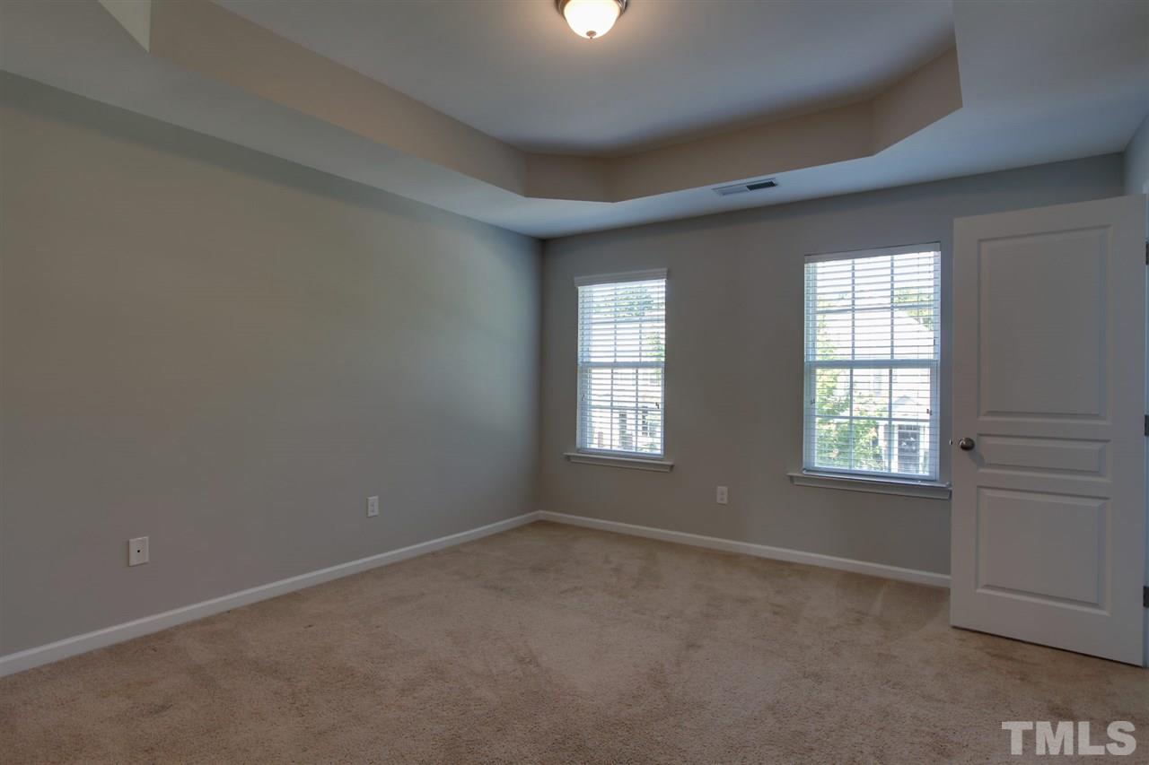 1025 Ileagnes Road Raleigh, NC 27603 - Photo 18 of 25 an empty room with windows