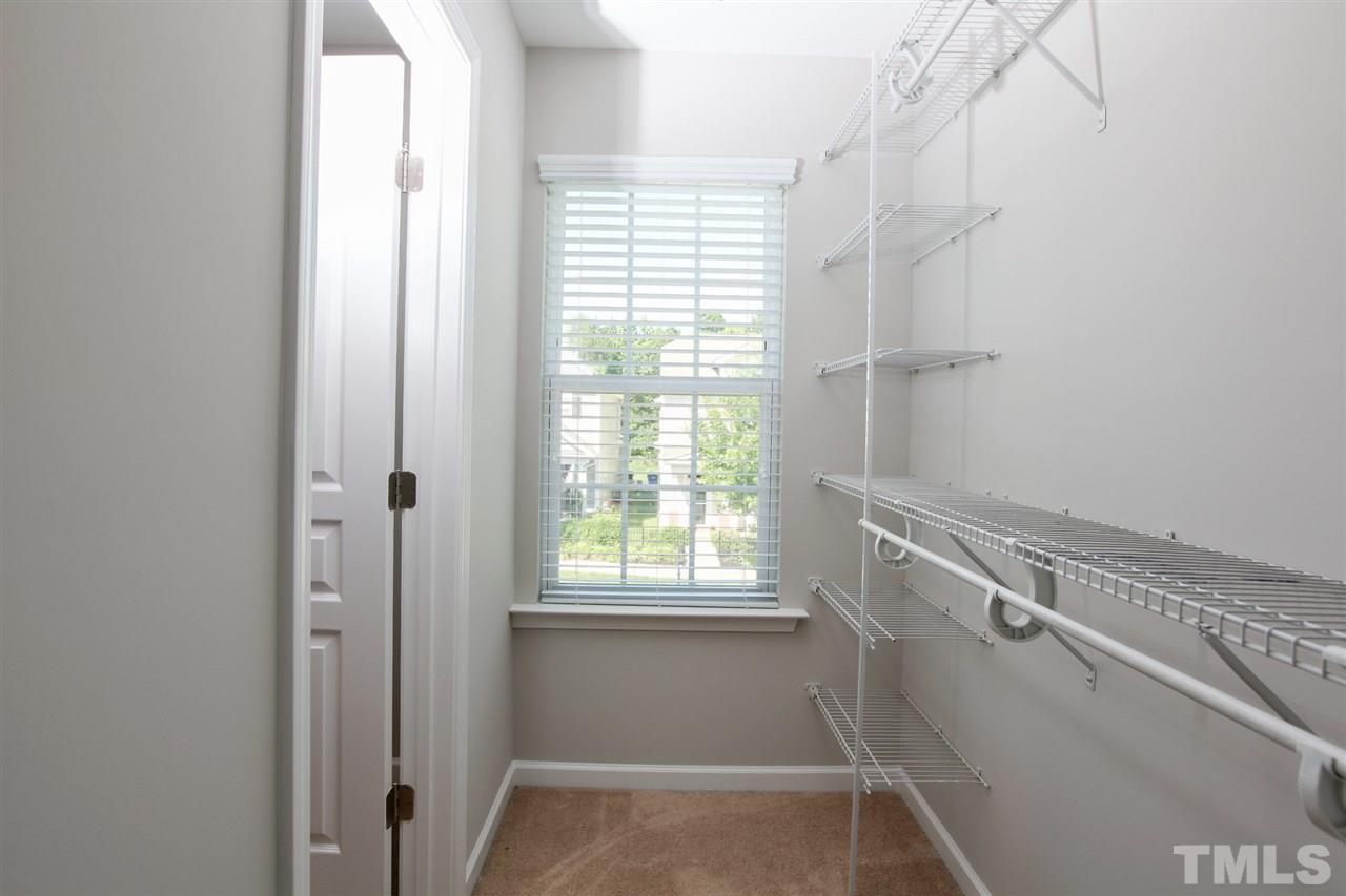 1025 Ileagnes Road Raleigh, NC 27603 - Photo 23 of 25 a bathroom with a window and shower
