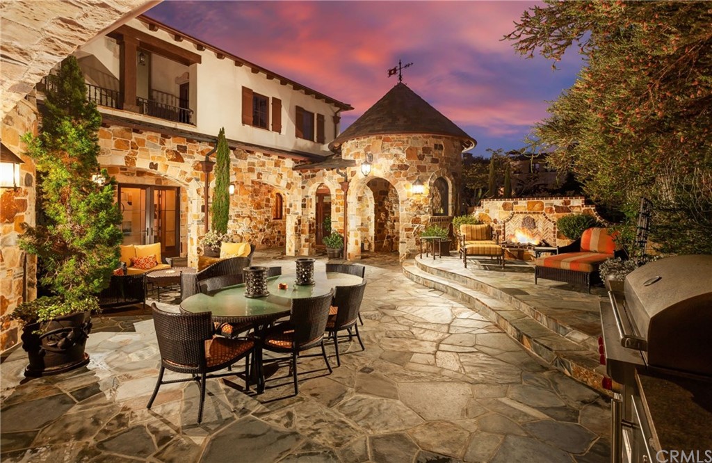 177 Shorecliff Road Corona del Mar, CA 92625 - Photo 6 of 48 a view of a patio with couches table and chairs and potted plants
