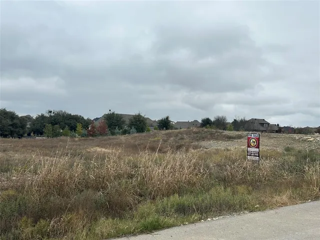 a view of lake with mountain in the background