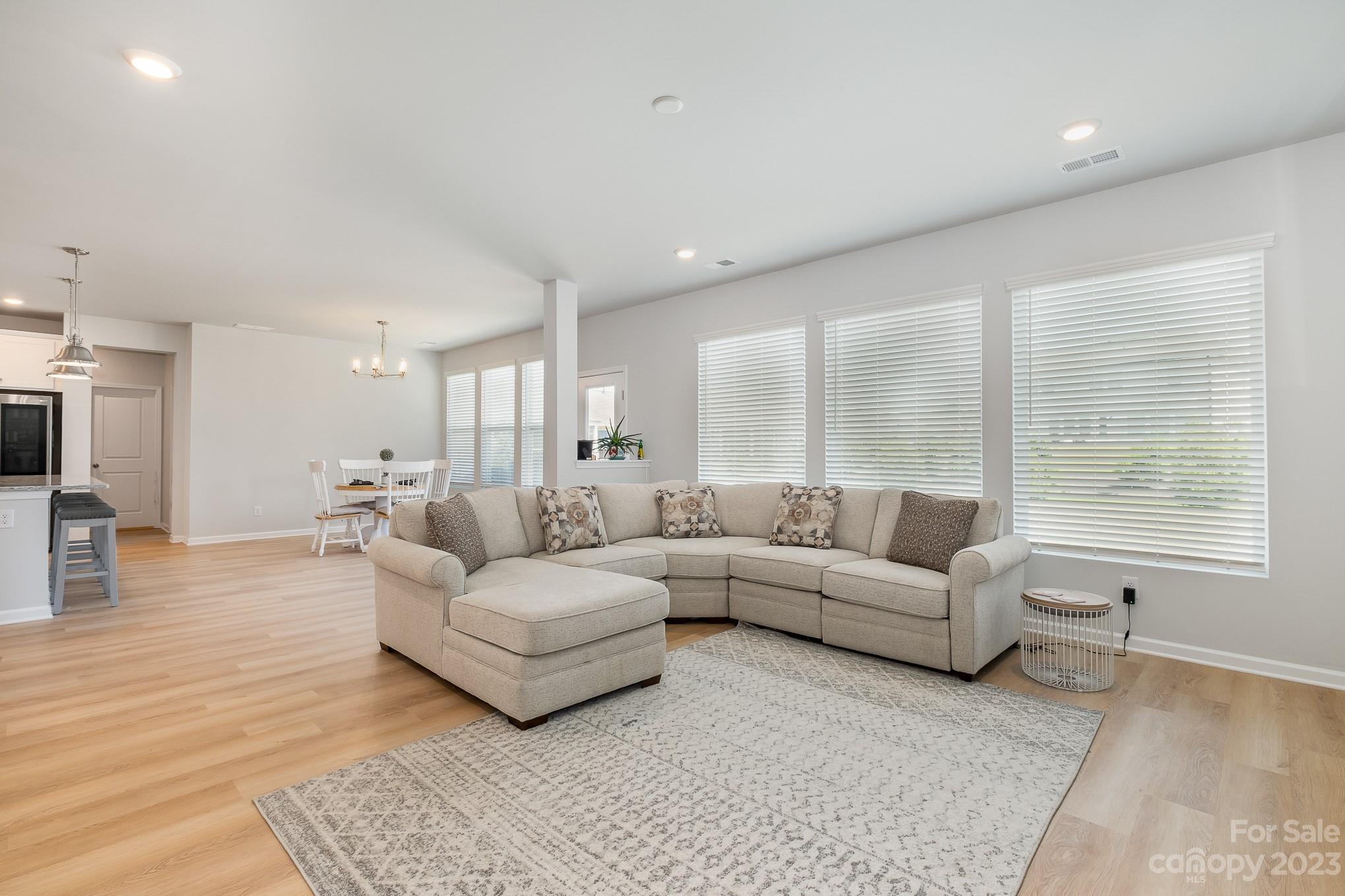7015 Messina Road Indian Land, SC 29707 - Photo 15 of 42 a living room with furniture and a large window